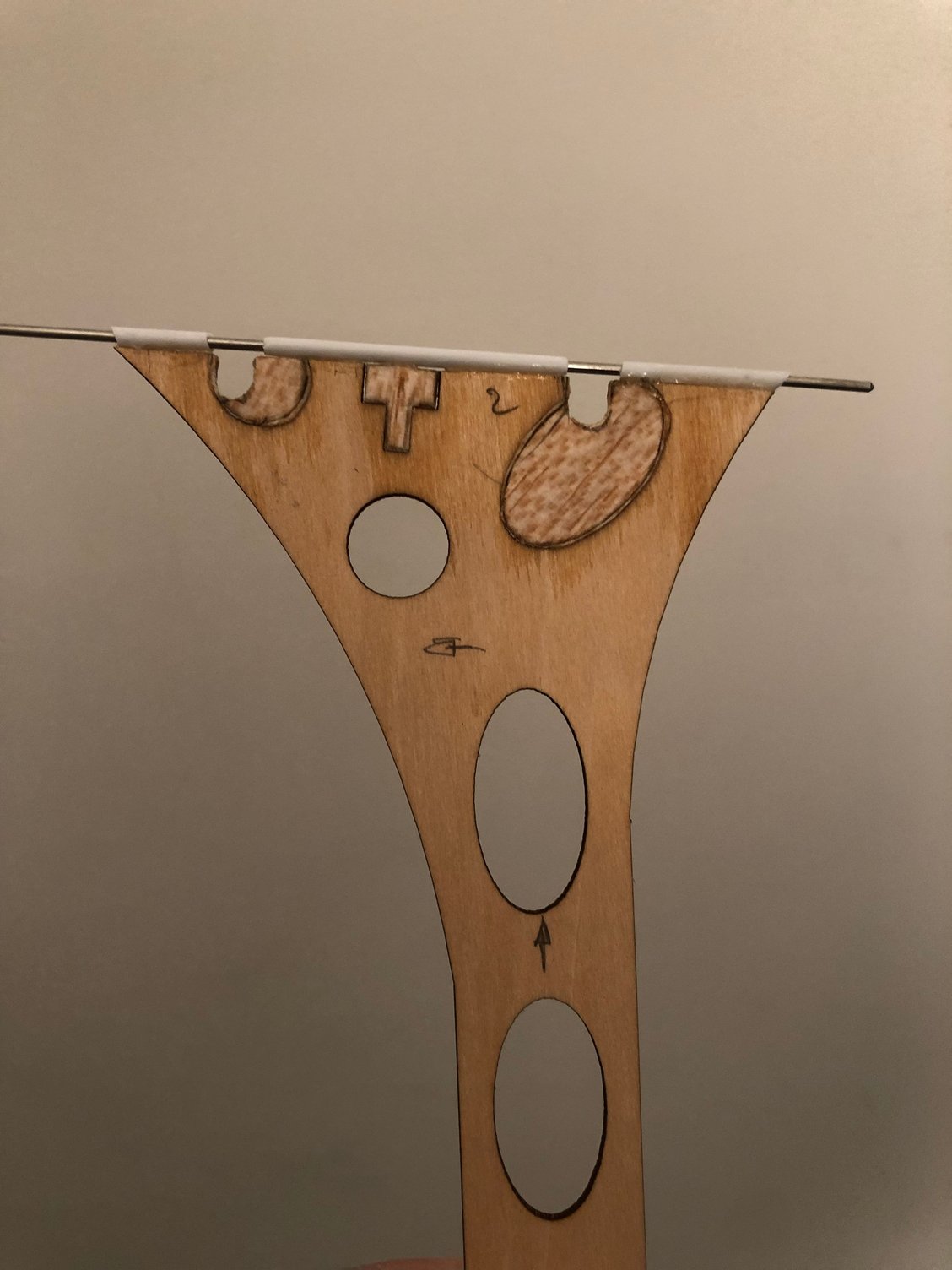 The small tube is glue in place and receive the 1,7 mm pin