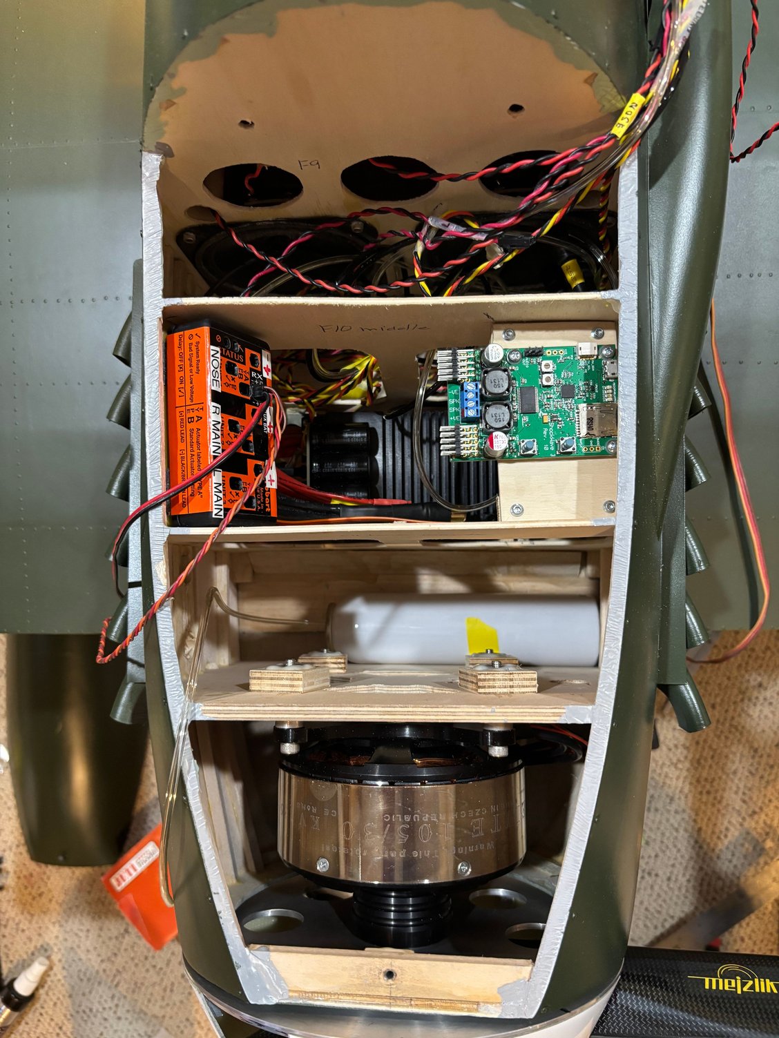 air tank in bay in front of motor. next bay has speed controller in the bottom, robart retract controller on left, sound module on right. The last item to go under rear hatch will be gear door air valve