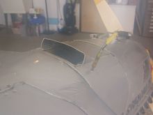 Here is the cowl flap-air exit, should create low pressure area to help air flow. 