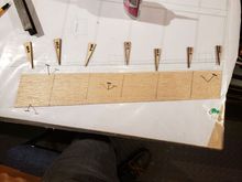 Cut bottom sheeting to size and lay out locations of the ribs.