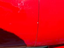 Small chip on back edge of cowl. 