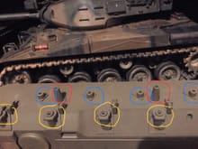 Blue indicates top mounting point for shock, red indicates mounting point for return rollers and yellow indicates mounting point for control arm. 

Front of tank is to left. 