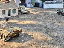 Shown here the Tamiya Centurion has just taken out the Panther to the right and is engaging the Panther in the foreground. The Centurion destroyed both Panthers but received enough hits that it was finally taken out by another tank before the end of the battle.