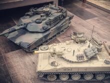 Tamiya Abrams in NATO camo and Sheridan in Desert Storm theme tan. 