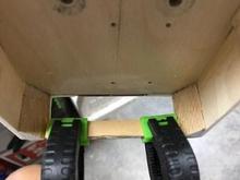 Air exhaust hole with reinforcement glued on and clamped.