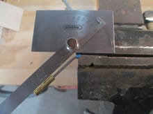 Clamped in my vise, I bent the end of the drive shaft, (which is called the "wiper") to 45 degrees.