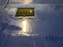 Here's a general idea of the size of the flap servo rod opening.  Smaller than I expected! I started the hole thru the flap side to locate then ream most from the servo pocket.