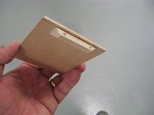 Receiver hatch retention means -