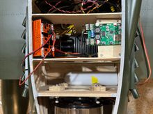 air tank in bay in front of motor. next bay has speed controller in the bottom, robart retract controller on left, sound module on right. The last item to go under rear hatch will be gear door air valve