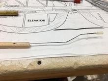 I also considered replacing the kit pushrods with more modern versions. Then I remembered how long my Eagle 63 flew without any control problems. Here, I have bent the aft wires to the shape on the plans.