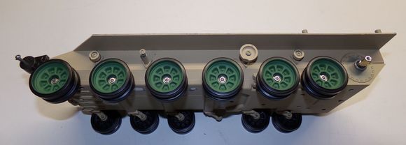 Replaced the Hooben wheels with the left over Heng Long ZTZ-99 wheels I had laying around after replacing them on my HL ZTZ-99 with metal ones.  I am not going to use metal wheels on this as the suspension arms are plastic and I don't know of any metal ones from Hooben.  The Hooben wheels had brass bushings, but I have installed bearings in the HL wheels.