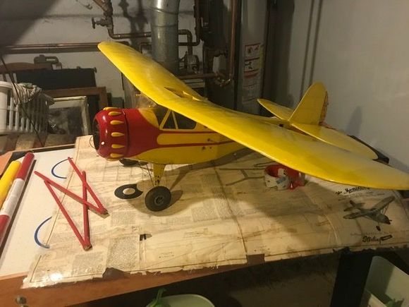 This is what it looks like so far.  I had to make new struts and line them up with the existing snaps on the wings. Luckily, I found some snaps tat worked in an old sewing box.