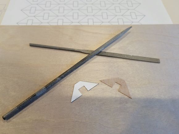 Here I have freed one of the paper gussets from the sheet and made a master gusset from plywood that will be used to make the rest that are needed.