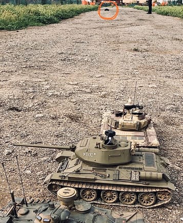 Side by side testing with Tamiya and stock “shaded” HL receivers. New IT receiver is in the middle installed on the T34. Notice the top of the photo tanks circled in red is ~80 feet away. Only the new receiver and Tamiya receiver indicated hits. 