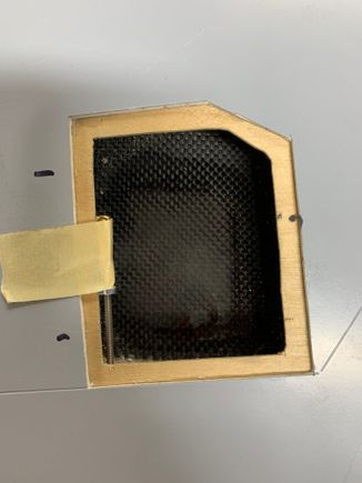 I wet out a bigger surface with epoxy after scuffing up the surface then put the slurry mix on top . Remove the servo or not just make sure the slurry fills the hole in the mount to lock it in