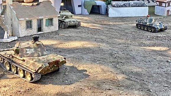 Shown here the Tamiya Centurion has just taken out the Panther to the right and is engaging the Panther in the foreground. The Centurion destroyed both Panthers but received enough hits that it was finally taken out by another tank before the end of the battle.
