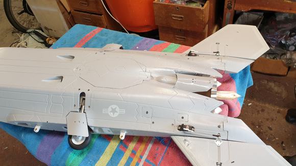 Could possibly make a better rear pipe cover, this one was just lying around!