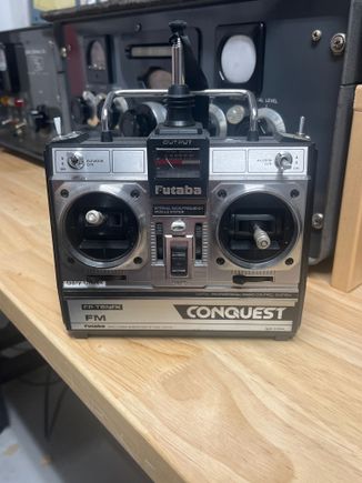 Conquest by Futaba TX. On 50 mHz, fairly a rare radio today. Works like a champ.