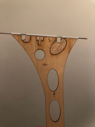 The small tube is glue in place and receive the 1,7 mm pin