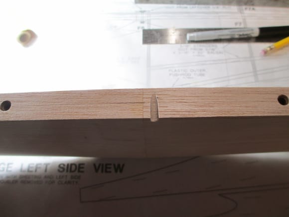 I cut a small groove in the trailing edge of the horizontal stabilizer.  This groove will allow clearance for the horn in the elevator joiner wire as it moves up and down. 