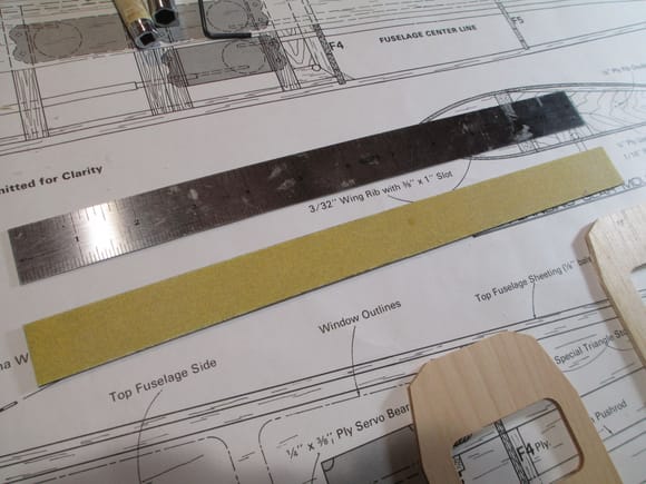 Here's a builders tip:  I always take one of my steel rulers and place sand paper on one side of it.  Why?  When marking the center lines on the face of each Former as an example will prevent the ruler from slipping.  