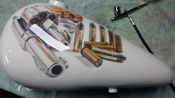 Left hand soft tail harley fuel tank.Painted this last year to represent the only spanner you need in the tool kit...:)