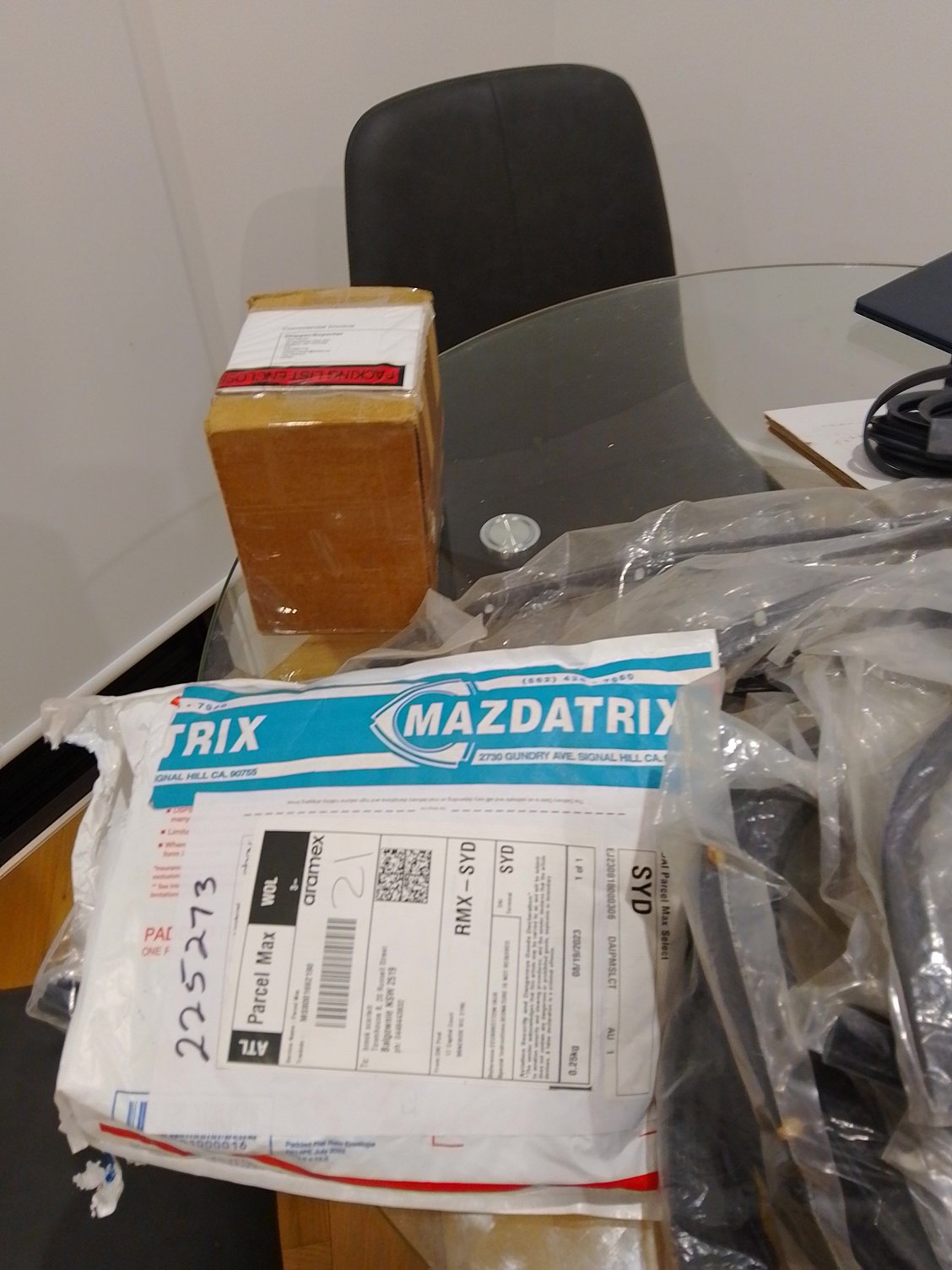 Mazdatrix packing and some of the rubbers for the Coupe.  In the box are parts for the horn for the 