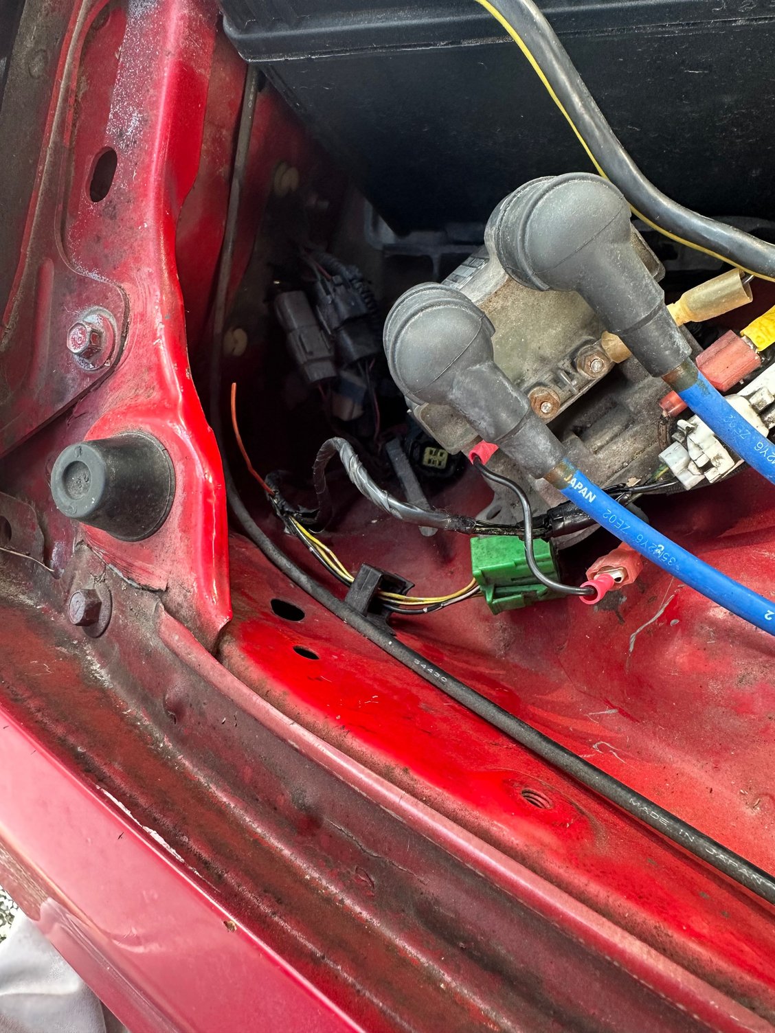 Orange wire on the left is where the connector should be attached