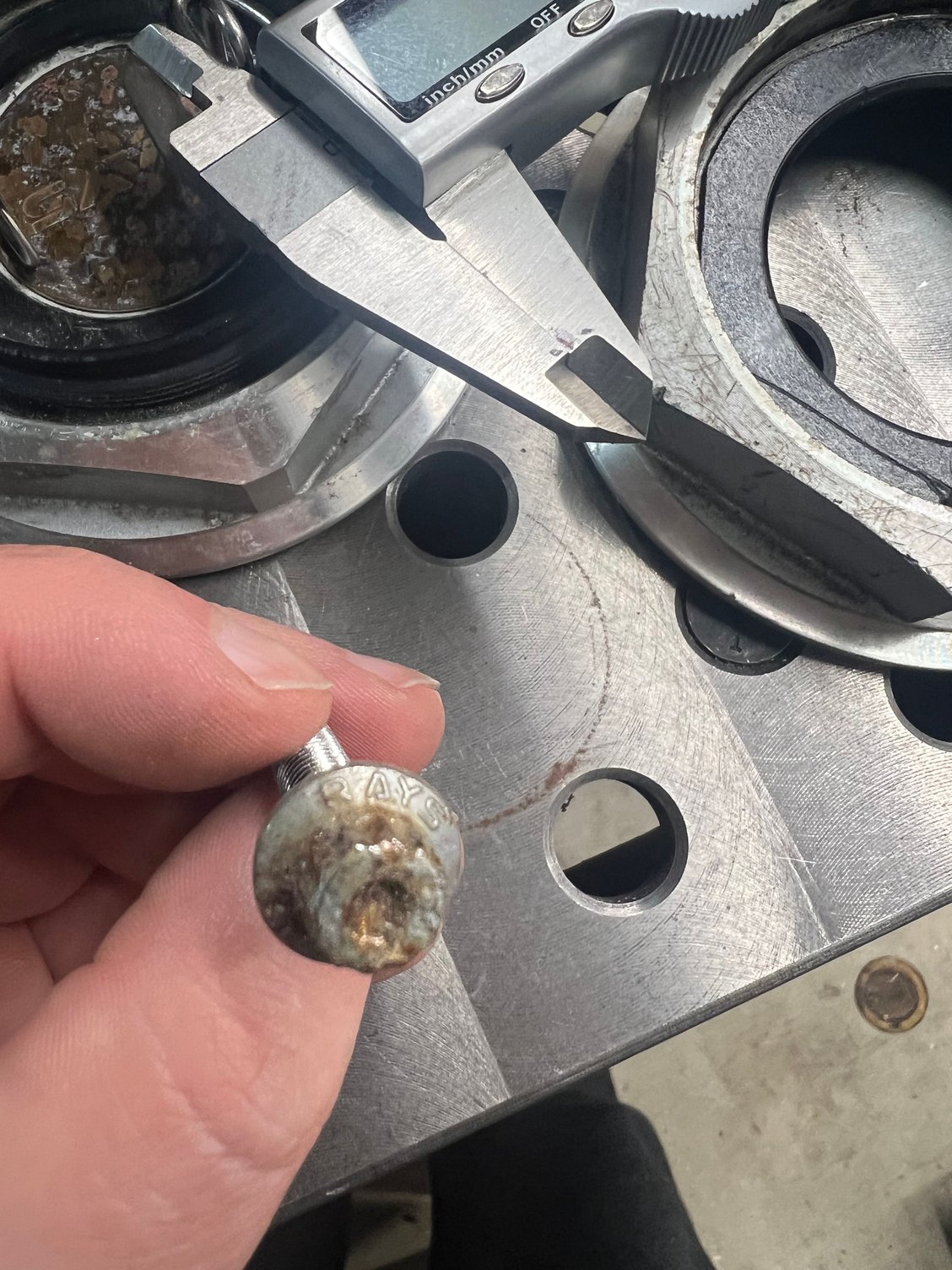 If anyone knows a good place for chrome plating old bolts let me know. The local place I tried wanted $5 per piece. I would have liked to reuse these Rays branded fasteners, but it was a lot cheaper to buy new non branded ones. They still look good in the pics above. 