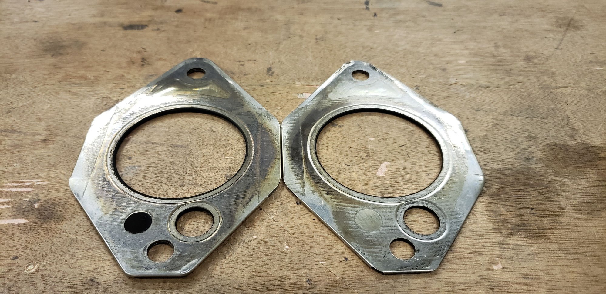 These OEM Exhaust manifold gaskets look reusable? Mazda