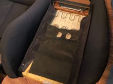Tearing the original covers off the seats.