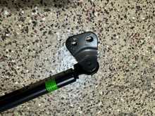 I can see there is no way of removing the bracket without getting rid of the rivet head.