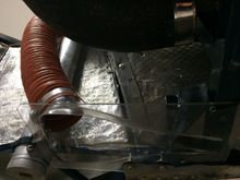 Naca duct under car for rear brake cooling.