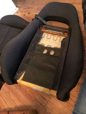 Tearing the original covers off the seats.