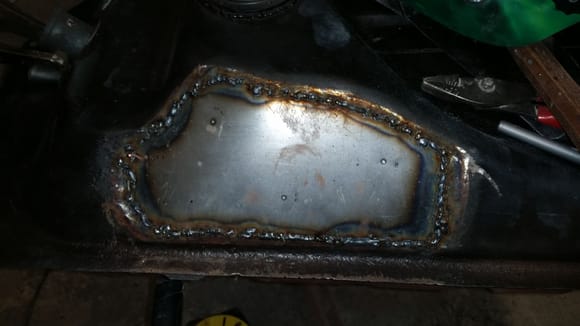 Welded in the patch, grinder welds, and went over it with panel bond