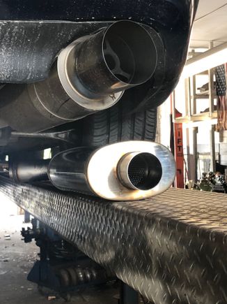 Getting rid of the canister and putting on a flow master with a few silencers and catalytic converters. It was a loud straight pipe before now it’s a sleeper