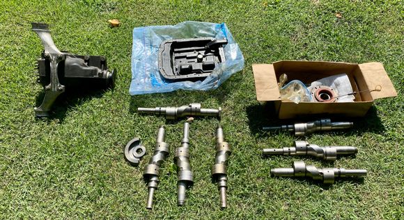 RX-8 rear diff, oil pan, 13B e-shafts, & front cover parts 