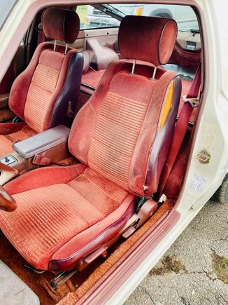 These are the seats that will be sold with the car. The stitching has degraded on the driver seat, resulting in the vinyl peeling like you see. They are out of a 1985 GSL-SE. 