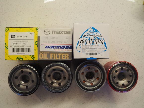 Group Shot. Note RE-A has orange color visible and the FEED filter has 8 holes vs 6.