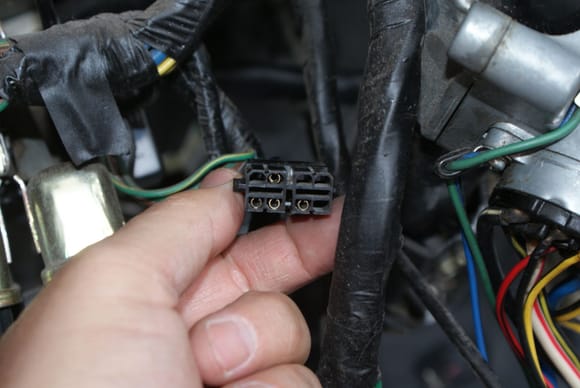 This was one side of the connection to the choke mechanism.  The wiring diagram says it should have 4 wires, which it does.