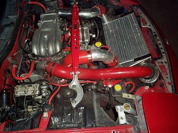 nice side shot of engine bay. it is hard to tell but i have two 3 inch cold air intakes stacked up front.