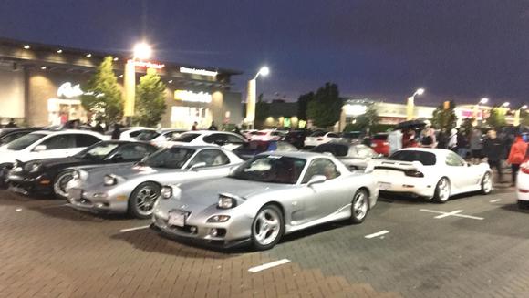 Crowd gathers around the Spirit R, market Crossing, June 17, 2021