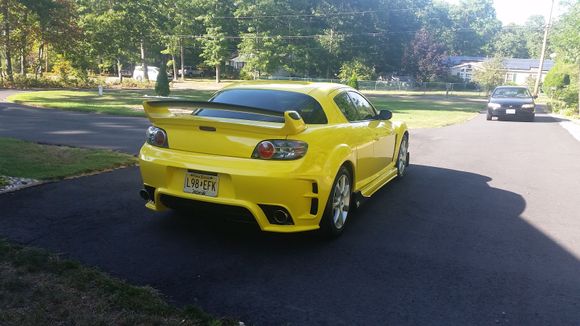 That is how the back turned out after he painted the black trims. (around the exhaust and on the bottom)