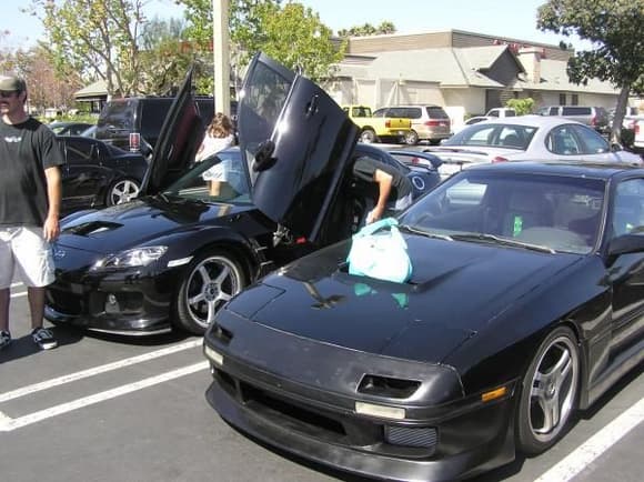 Funny how your image of the RX7 and RX8 change when you put a purse on one and wing doors on the other