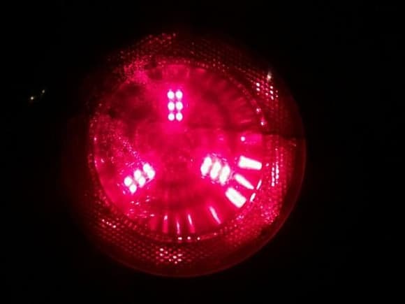 spider bulb with smoke taillight at night