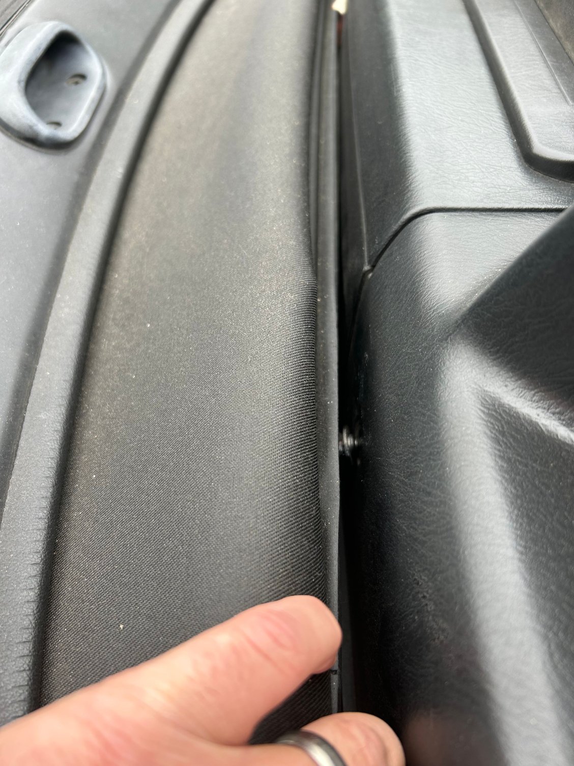 The other bolt was loose and dangling. Probably from the glass hitting/resting on it