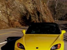 A yellow 2001 S2000