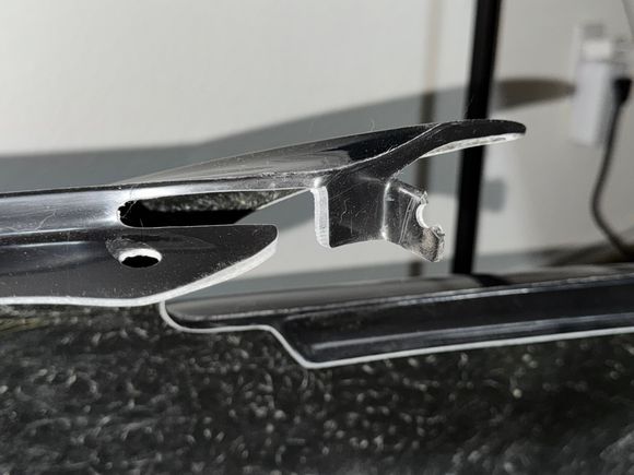 the broken tab was like this when I received it. BOTH SIDES ARE LIKE THIS