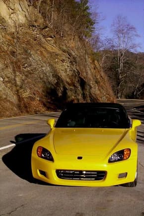 A yellow 2001 S2000