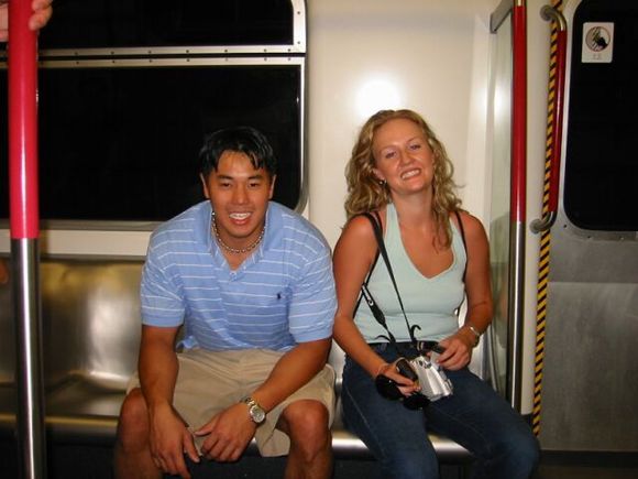 Emily and I sitting in the MTR.jpg
